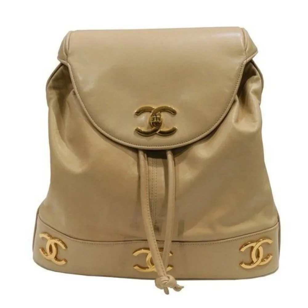 CHANEL CC Vintage Lambskin Beige Gold Backpack Bag Drawstring Chain - Picture 1 of 15